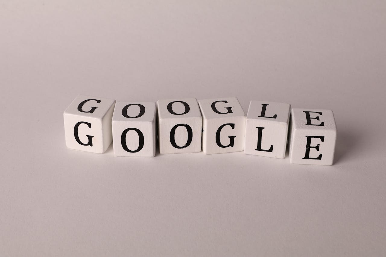 team-01 White blocks with letters spelling Google, symbolizing search and SEO concepts.